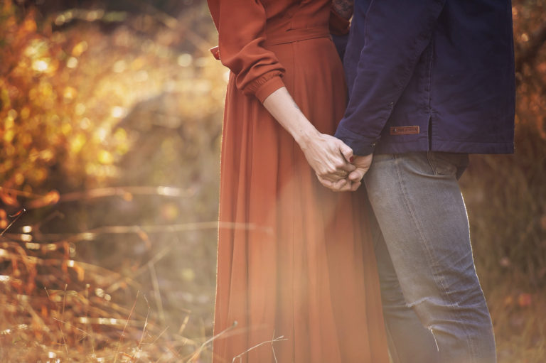 loving couple holding hands glow session