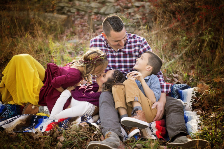 outdoor family photo on blanket