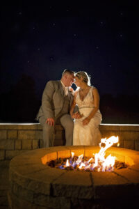 nighttime photo of bride and groom